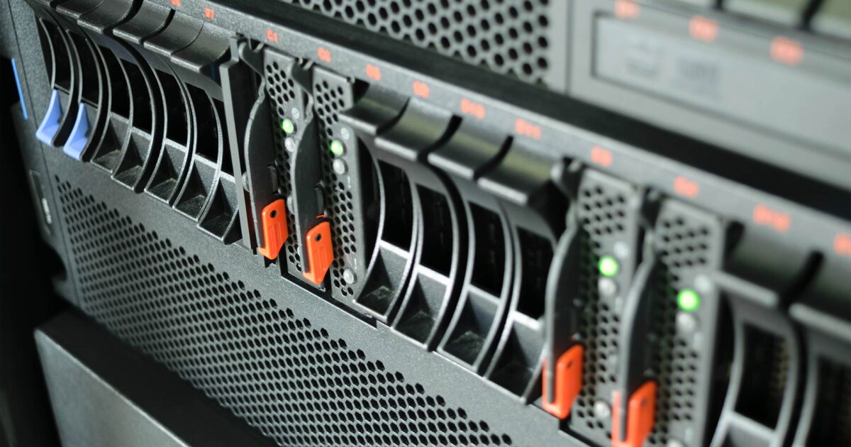 Close-up of server hardware with drive bays and indicator lights about data backups, the Piccola Tech's IT maintenance support services.